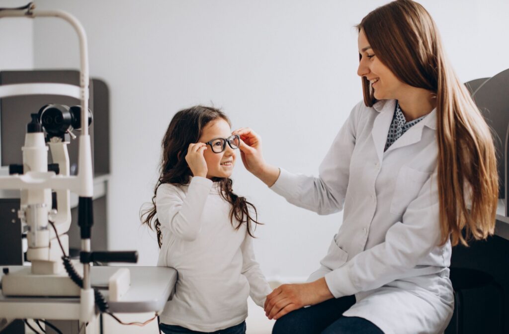 Child having a routine eye exam with an optometrist to monitor and manage myopia progression.